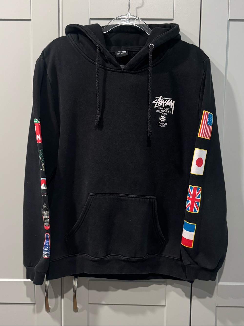 Stussy Black Flag Sleeve Hoodie with International Patch Details